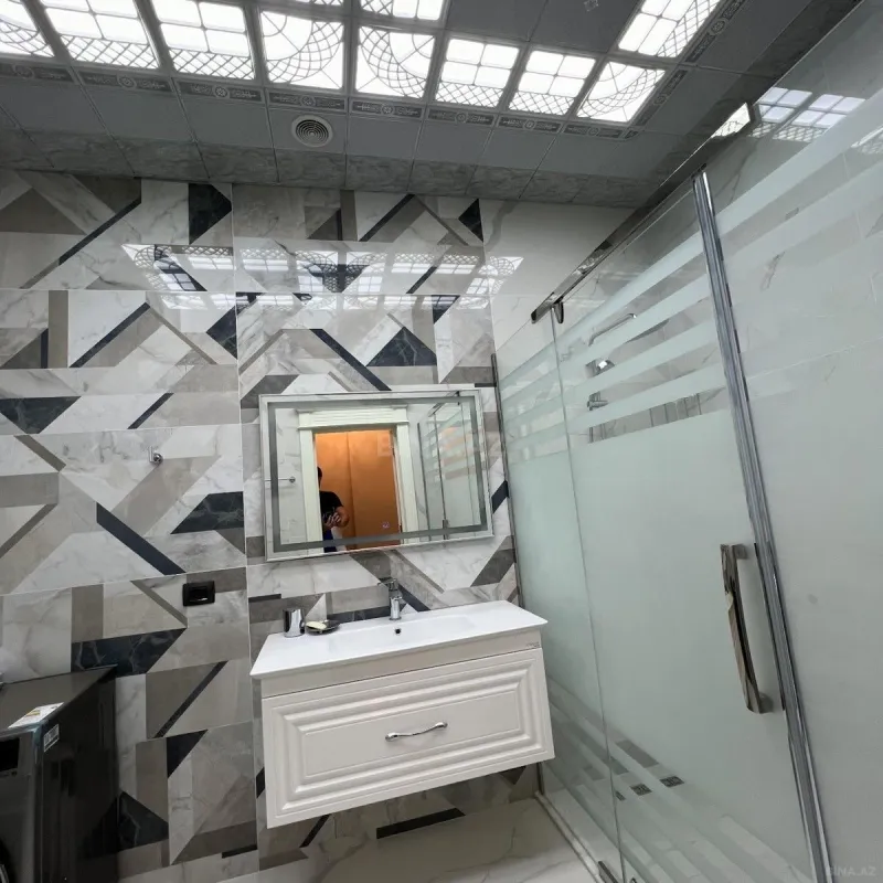 Satılır 4 otaqlı mənzil 214 m²