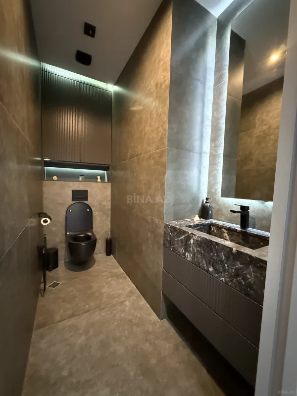 Satılır 4 otaqlı mənzil 147 m²