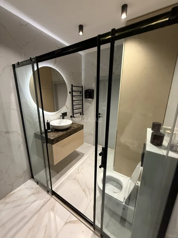 Satılır 4 otaqlı mənzil 147 m²