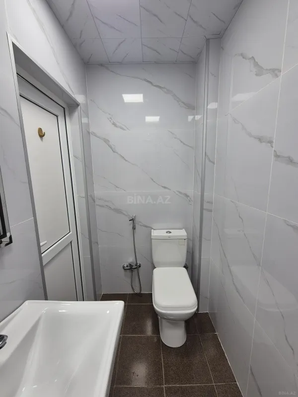 Satılır 2 otaqlı mənzil 56 m²
