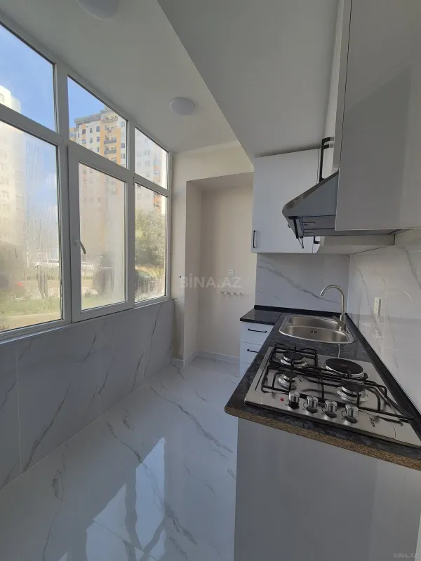 Satılır 2 otaqlı mənzil 56 m²