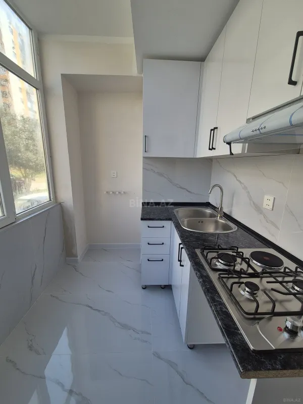 Satılır 2 otaqlı mənzil 56 m²