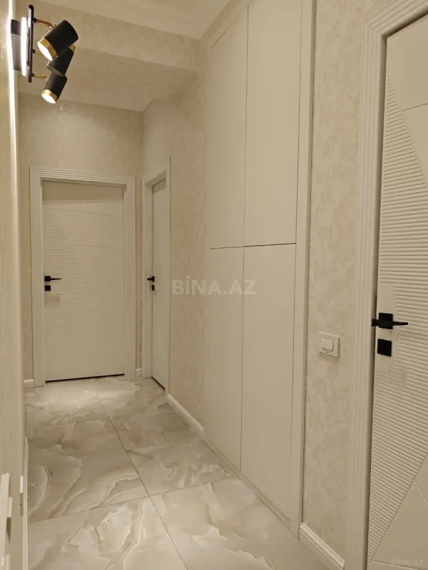 Satılır 4 otaqlı mənzil 124 m²
