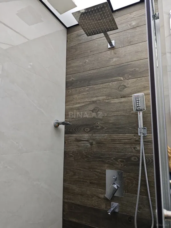 Satılır 4 otaqlı mənzil 124 m²