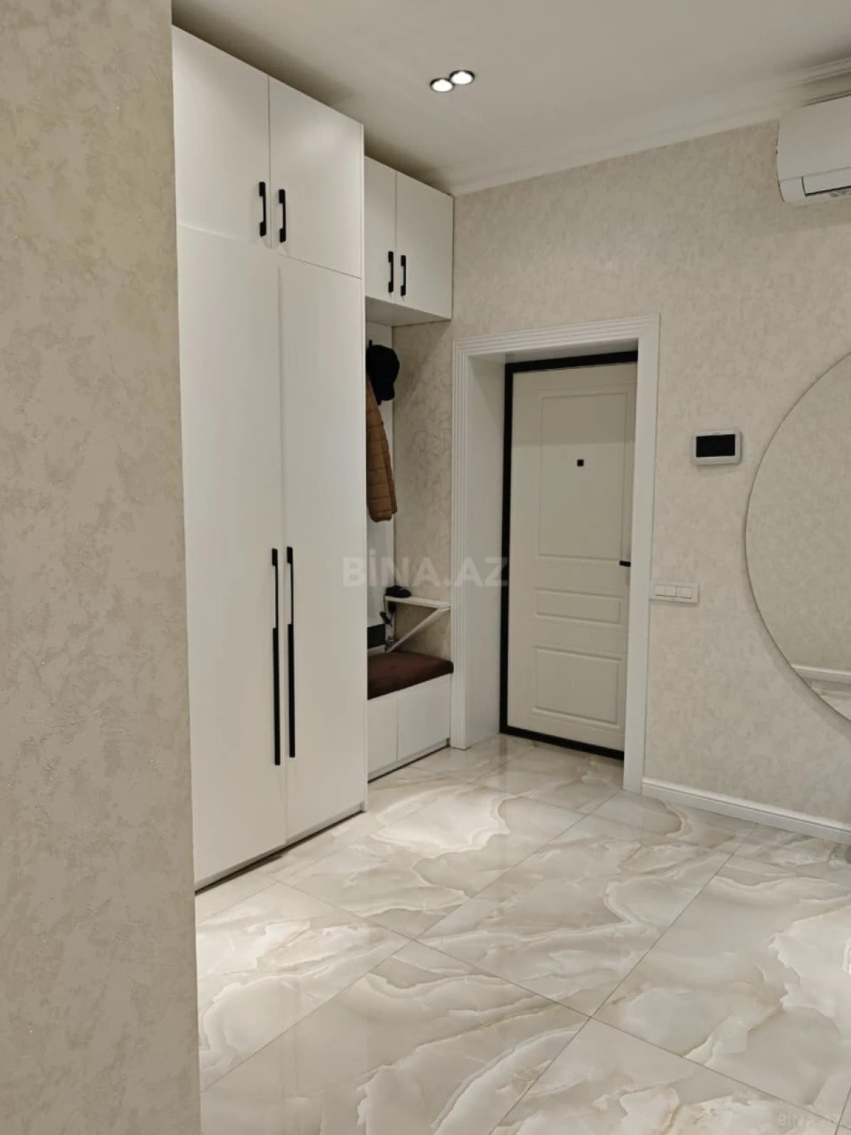 Satılır 4 otaqlı mənzil 124 m²