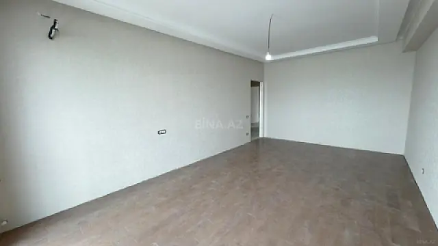 Satılır 4 otaqlı mənzil 122 m²