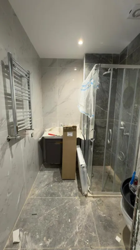 Satılır 4 otaqlı mənzil 122 m²