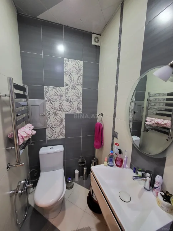 Satılır 4 otaqlı mənzil 164 m²
