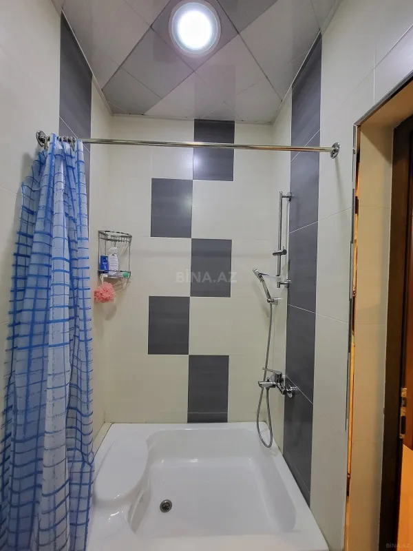 Satılır 4 otaqlı mənzil 164 m²