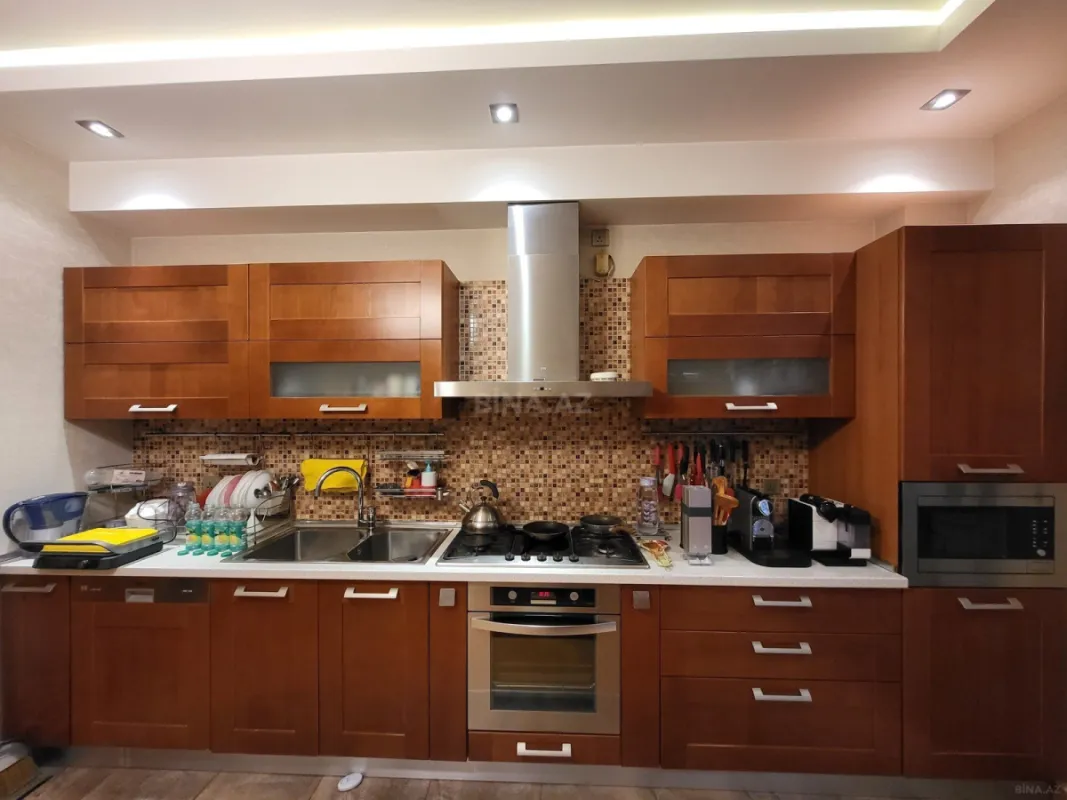 Satılır 4 otaqlı mənzil 164 m²