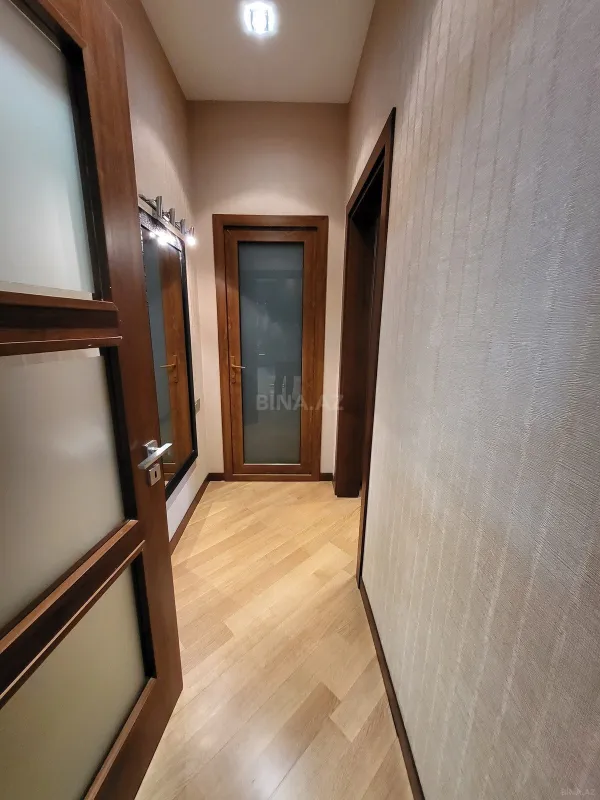 Satılır 4 otaqlı mənzil 164 m²