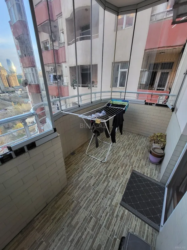Satılır 4 otaqlı mənzil 164 m²