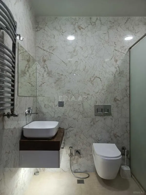 Satılır 3 otaqlı mənzil 107 m²