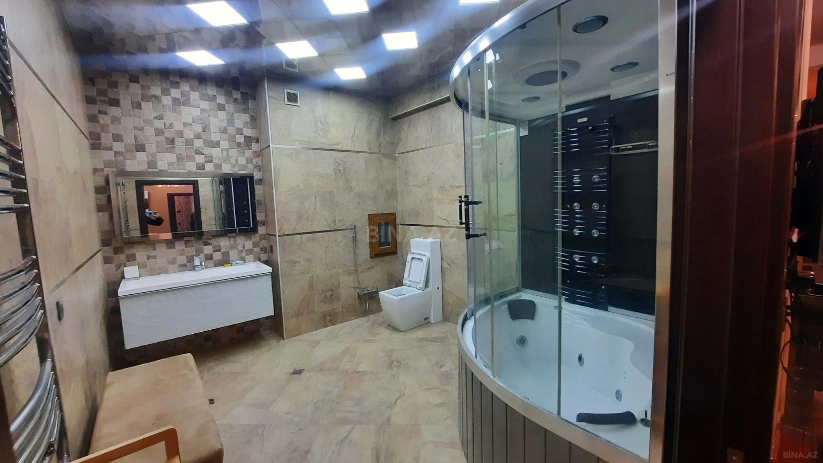 Satılır 4 otaqlı mənzil 214 m²