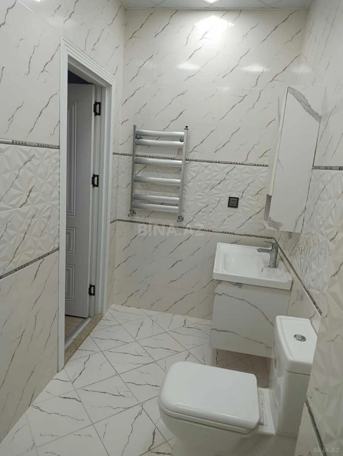 Satılır 4 otaqlı mənzil 149 m²