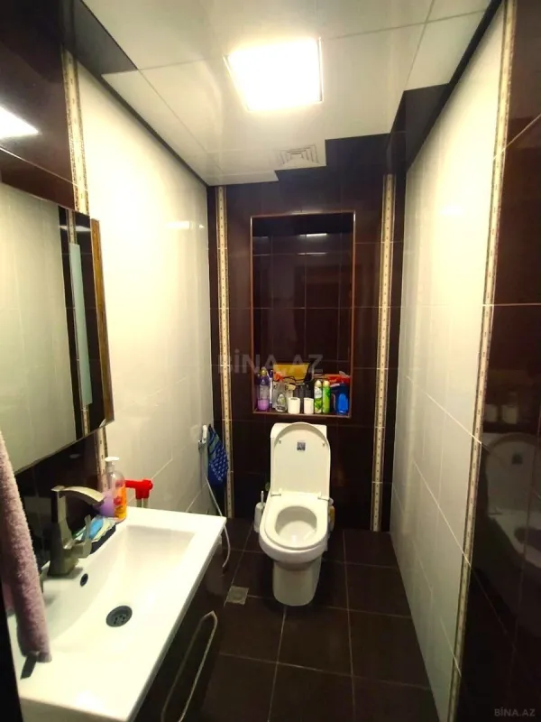 Satılır 4 otaqlı mənzil 135.7 m²