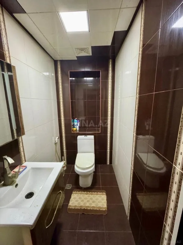 Satılır 4 otaqlı mənzil 135.7 m²