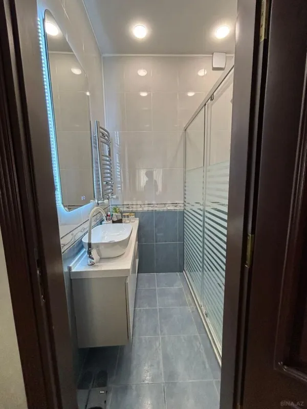 Satılır 4 otaqlı mənzil 165 m²