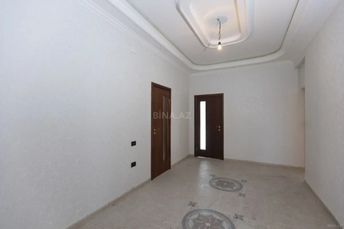 Satılır 4 otaqlı mənzil 210 m²