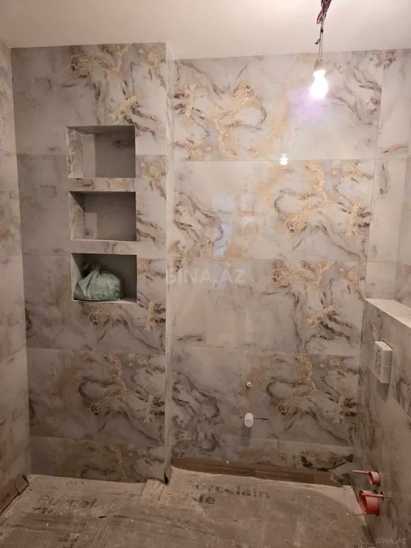 Satılır 3 otaqlı mənzil 138 m²