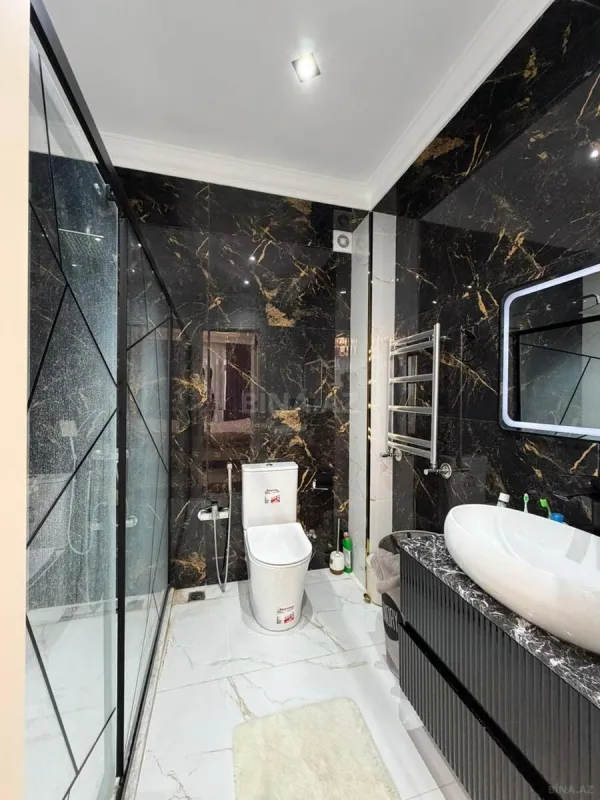 Satılır 4 otaqlı mənzil 153 m²