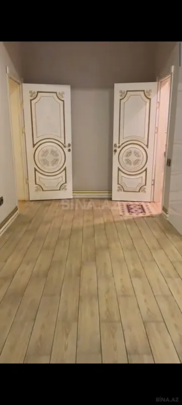 Satılır 4 otaqlı mənzil 147 m²