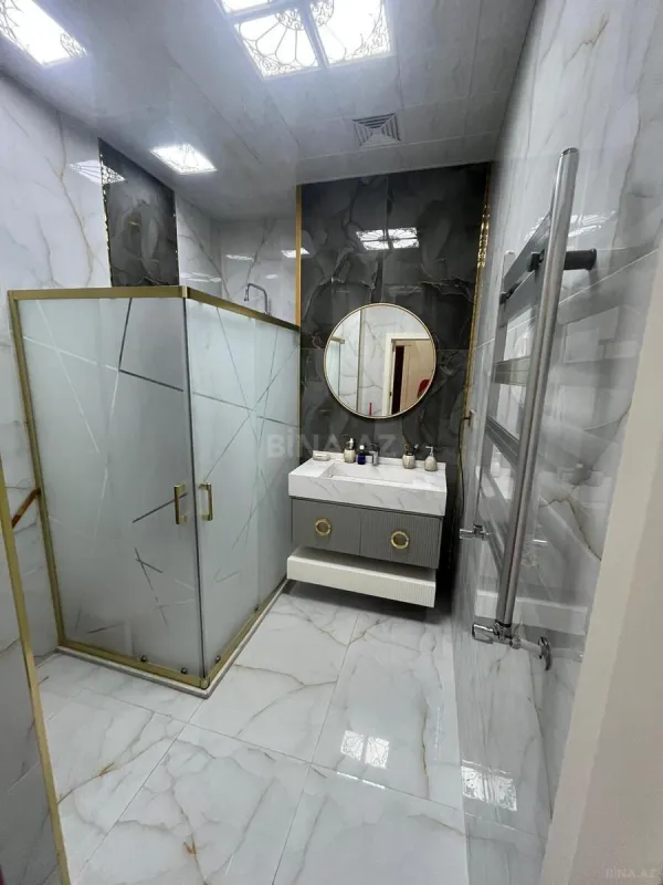Satılır 4 otaqlı mənzil 150 m²