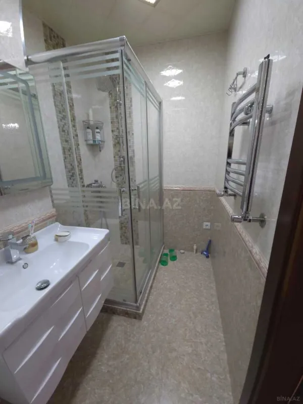 Satılır 4 otaqlı mənzil 152 m²
