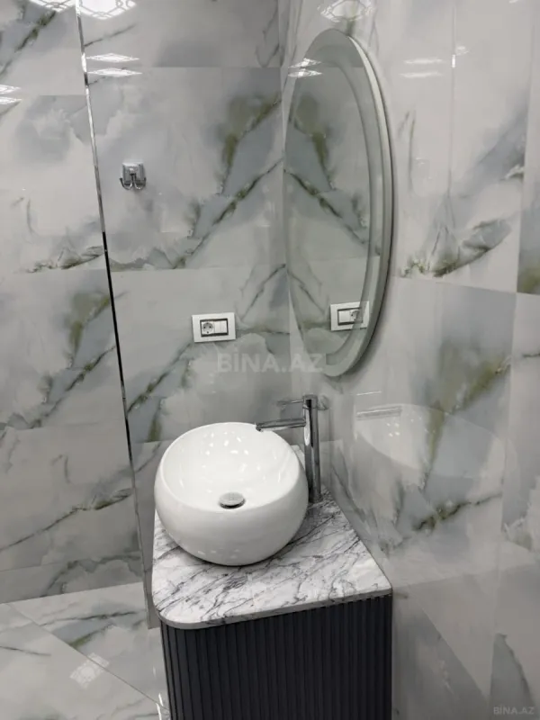 Satılır 3 otaqlı mənzil 102 m²