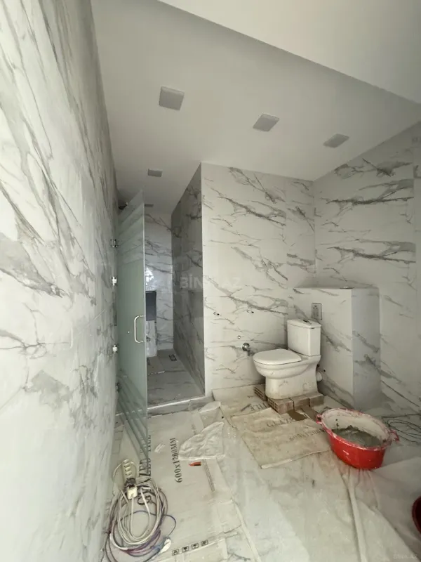 Satılır 4 otaqlı mənzil 210 m²