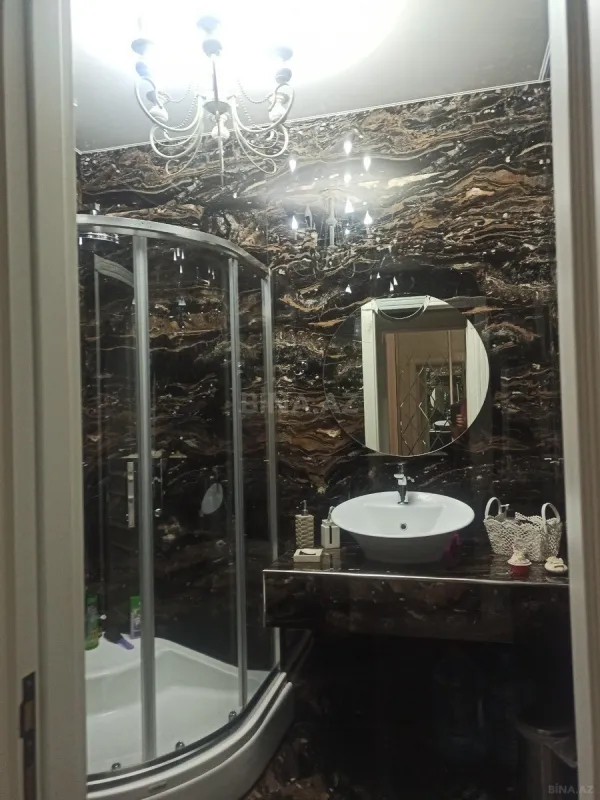 Satılır 4 otaqlı mənzil 165 m²