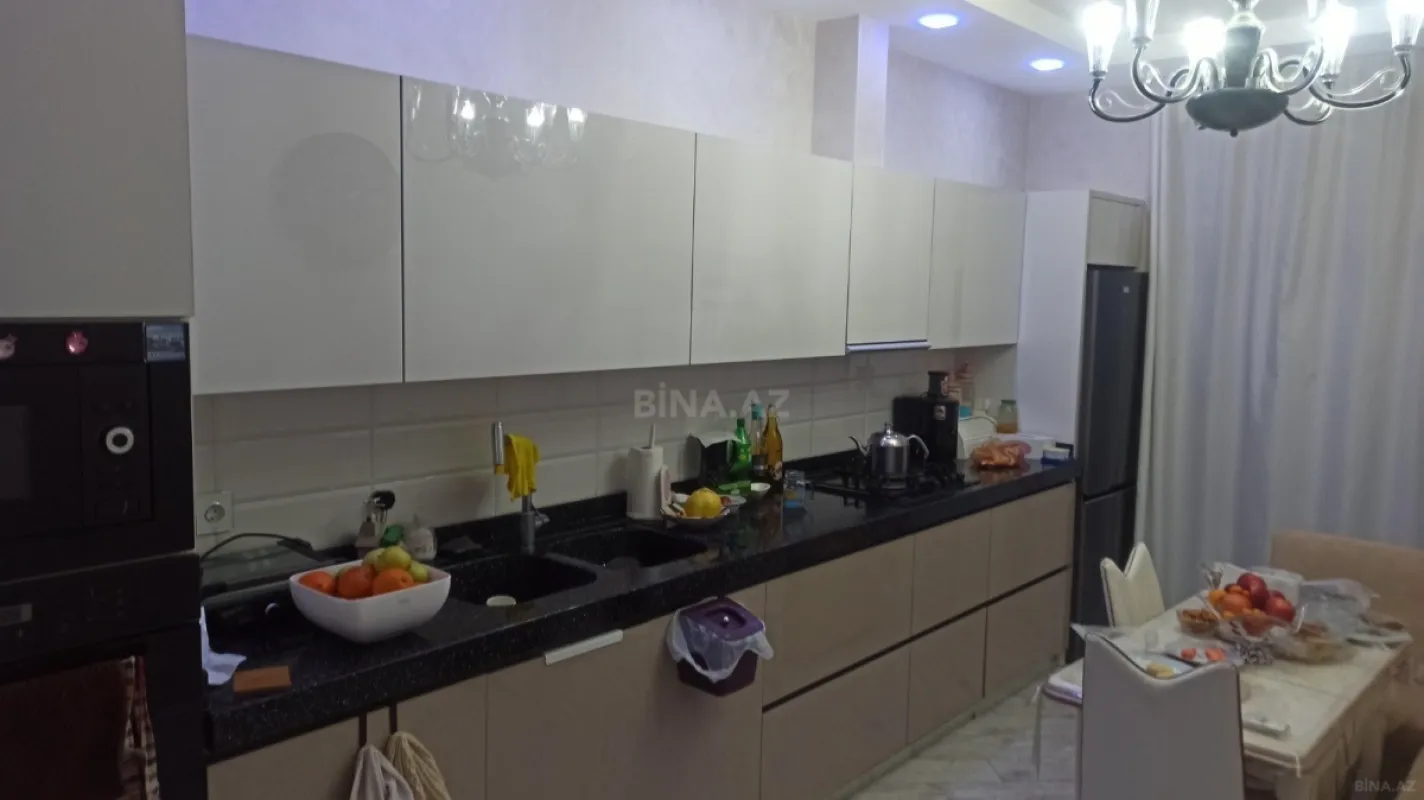 Satılır 4 otaqlı mənzil 165 m²