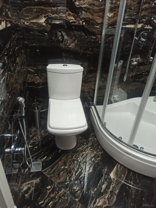 Satılır 4 otaqlı mənzil 165 m²