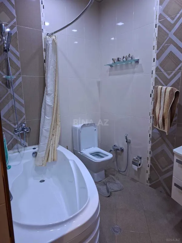 Satılır 4 otaqlı mənzil 159 m²