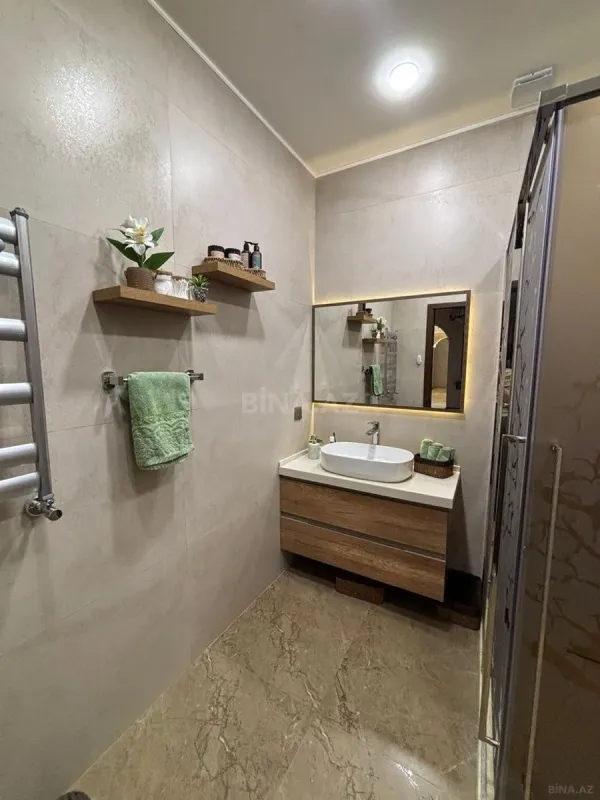 Satılır 4 otaqlı mənzil 165 m²