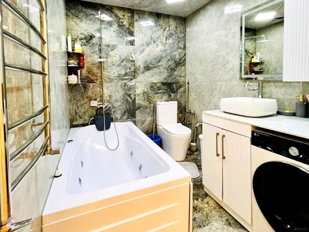 Satılır 4 otaqlı mənzil 140 m²