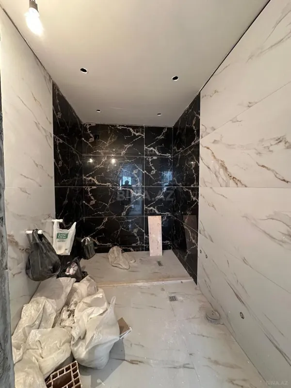 Satılır 4 otaqlı mənzil 146 m²