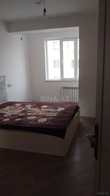 Satılır 2 otaqlı mənzil 82.2 m²