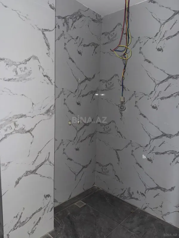 Satılır 2 otaqlı mənzil 77 m²