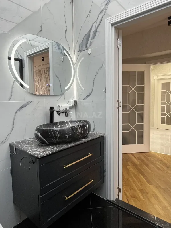 Satılır 4 otaqlı mənzil 155 m²