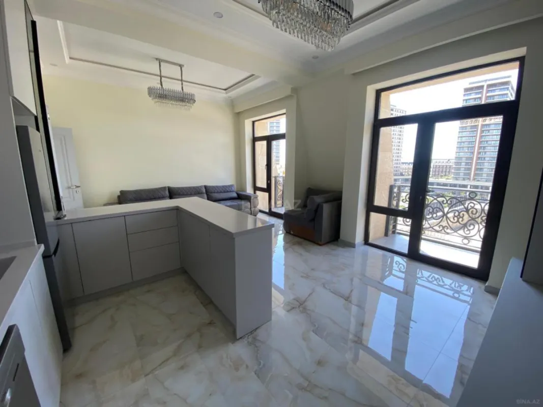 Satılır 4 otaqlı mənzil 121 m²