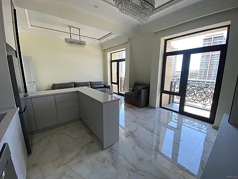 Satılır 4 otaqlı mənzil 121 m²