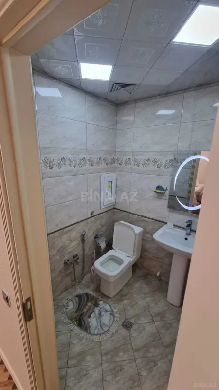 Satılır 4 otaqlı mənzil 130 m²