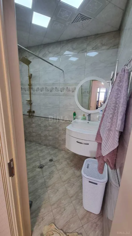 Satılır 4 otaqlı mənzil 130 m²