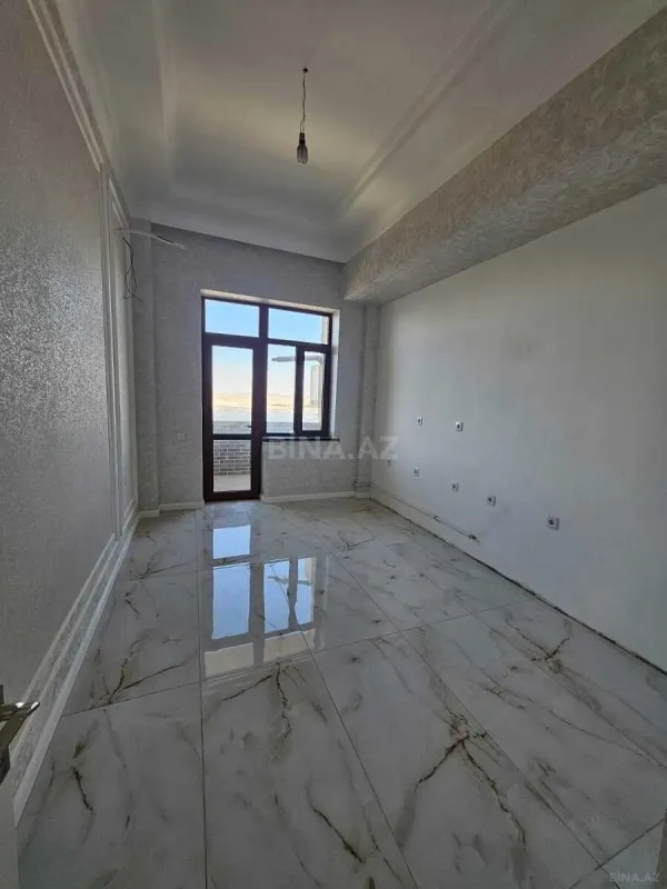 Satılır 2 otaqlı mənzil 90 m²