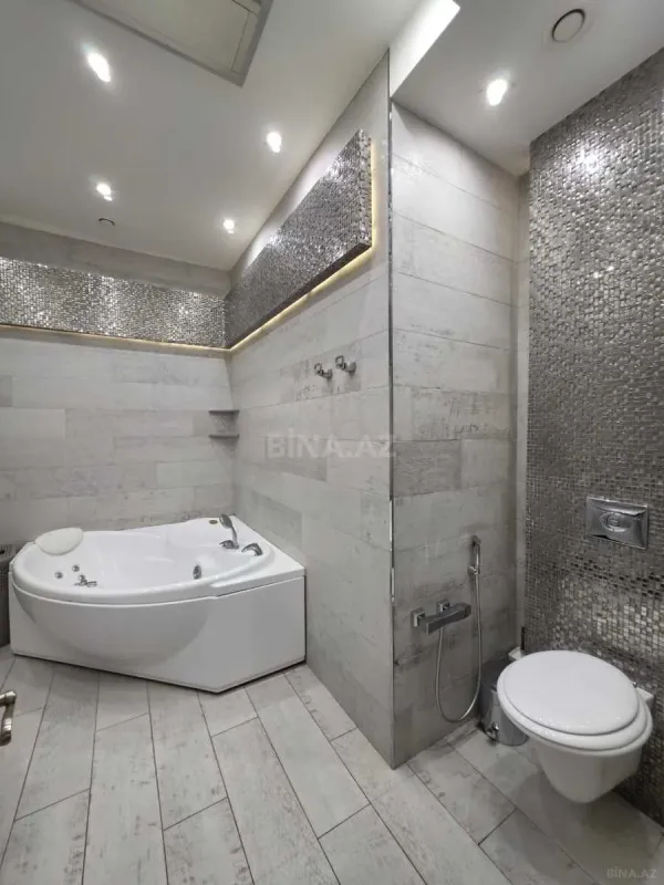 Satılır 4 otaqlı mənzil 240 m²