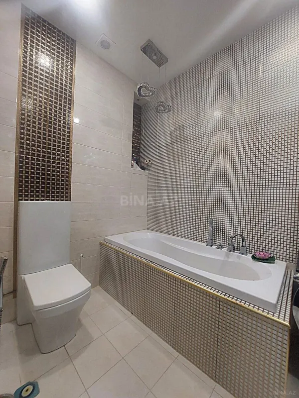 Satılır 4 otaqlı mənzil 170 m²