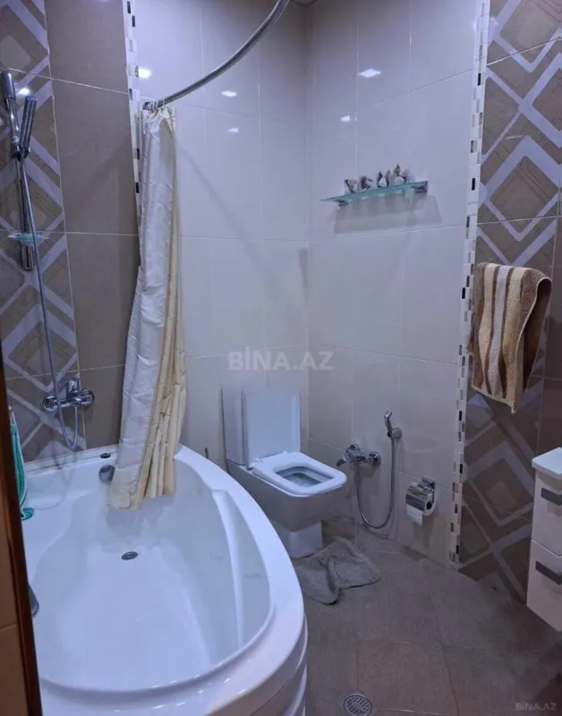 Satılır 4 otaqlı mənzil 159 m²