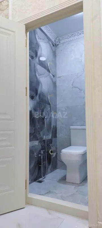 Satılır 4 otaqlı mənzil 140 m²