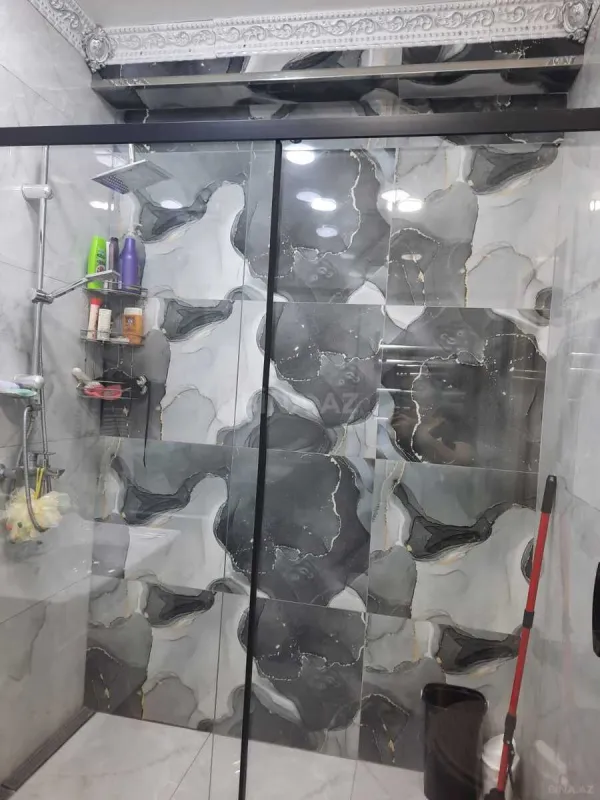 Satılır 4 otaqlı mənzil 140 m²